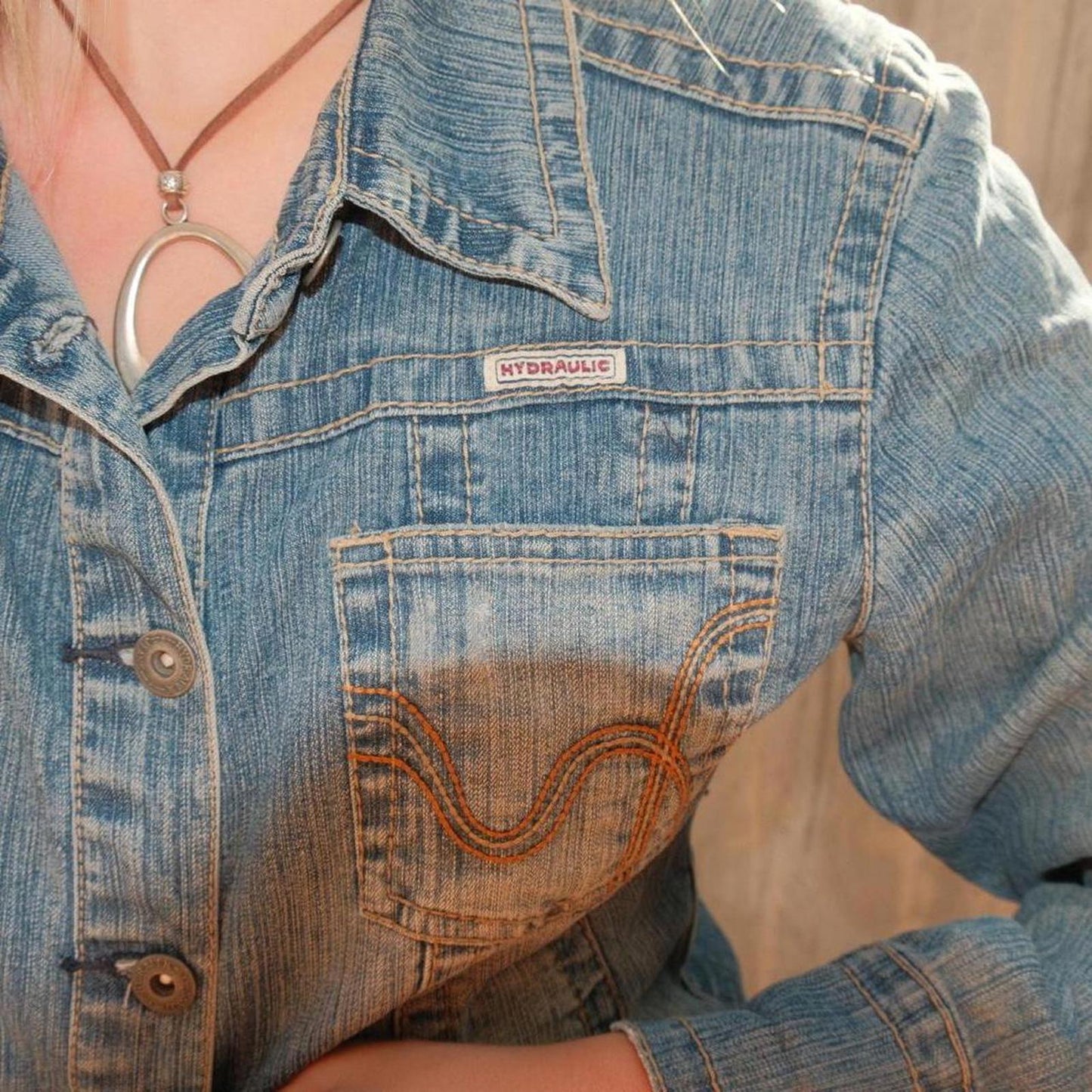 Cute Hydraulic vintage 90s denim jacket with a small stain on the back jacket