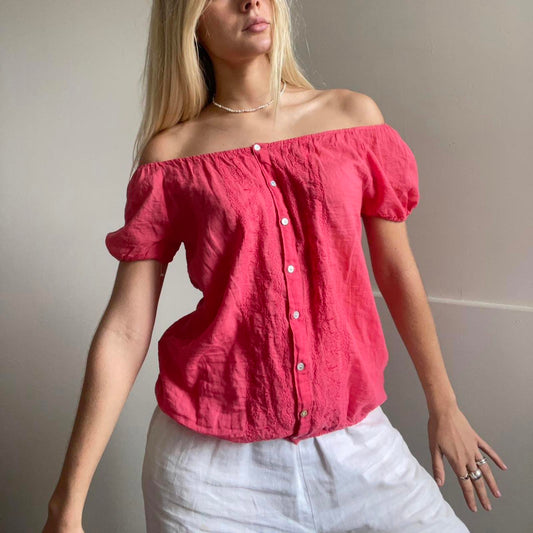 Pink button up top